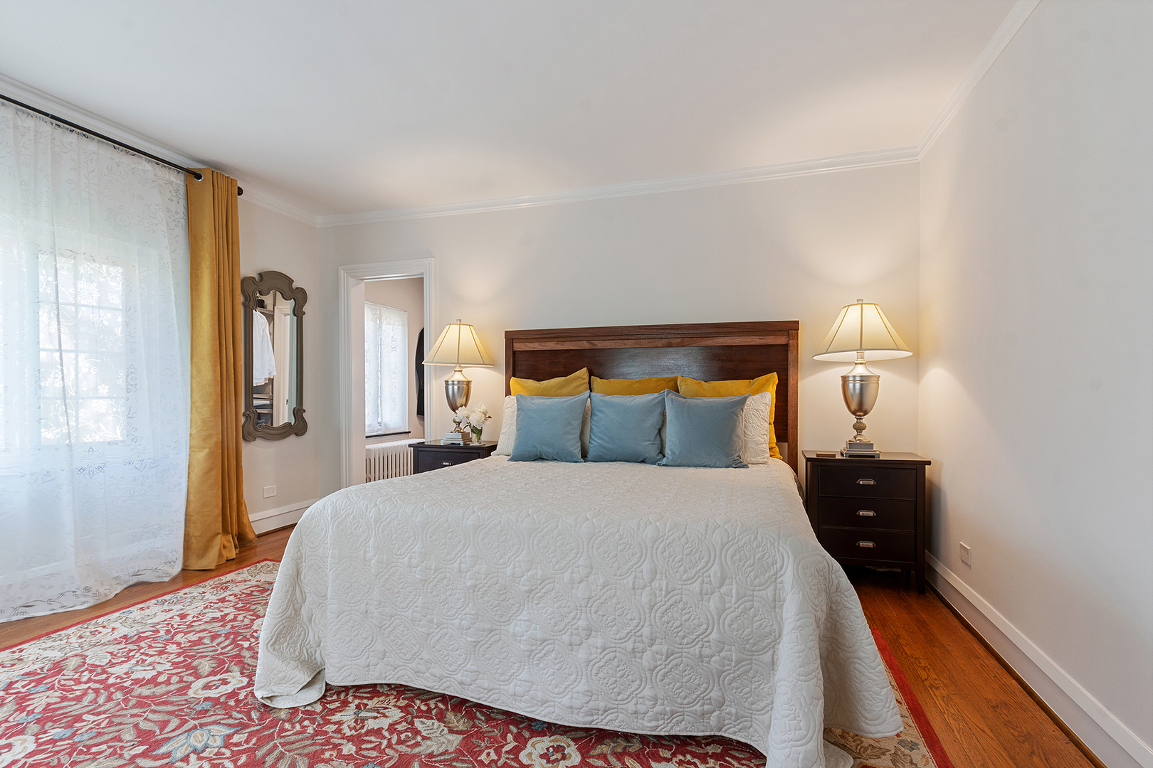 833 Kimball Road Highland Park, IL 60035 - Photo 14 of 29 a bedroom with a bed and window