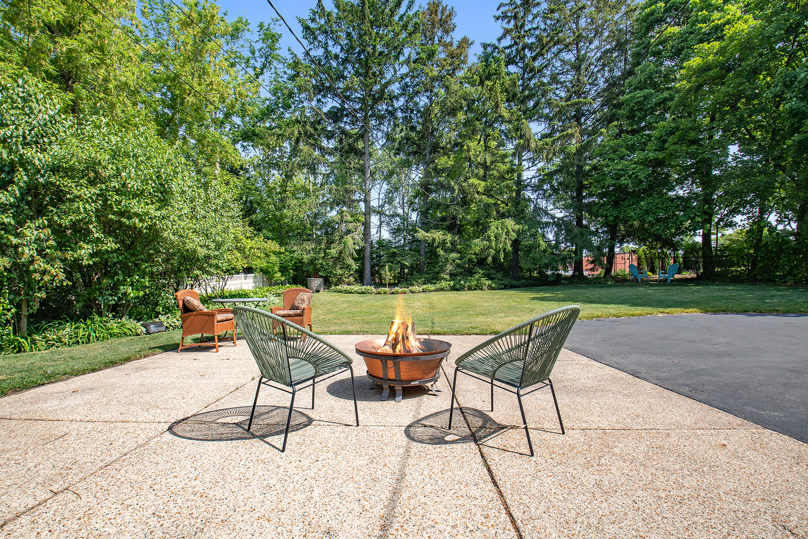 833 Kimball Road Highland Park, IL 60035 - Photo 28 of 29 a swimming pool with outdoor seating and garden