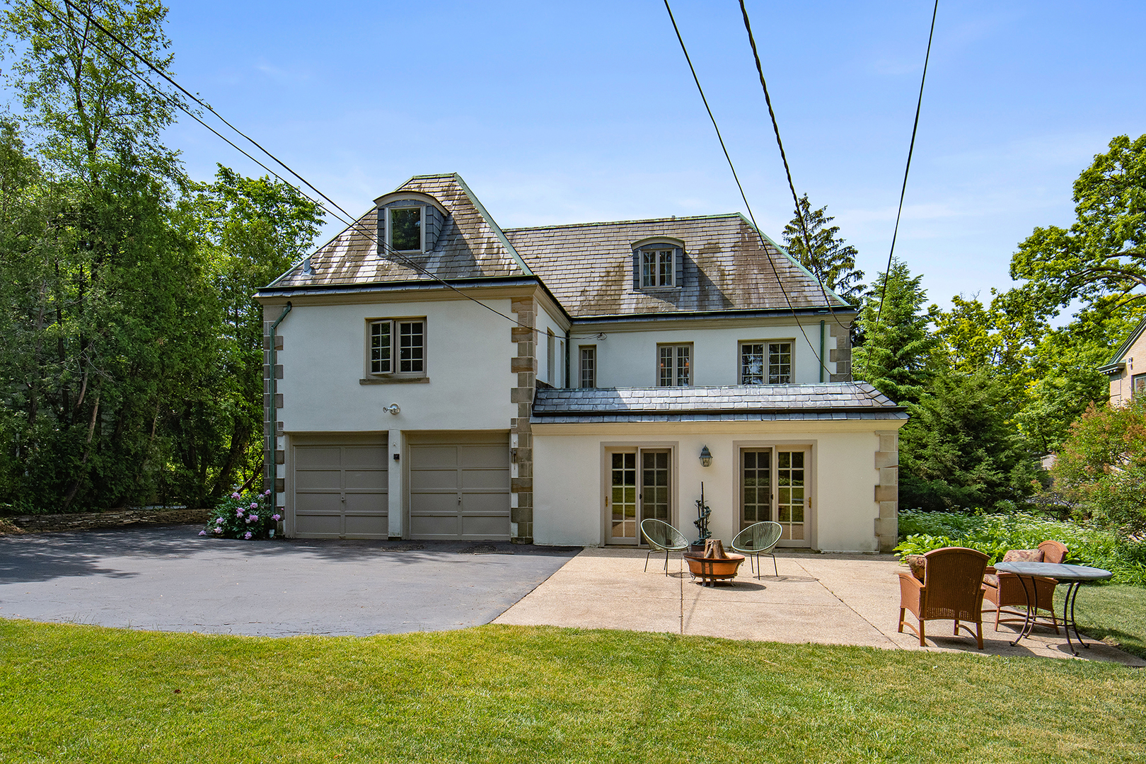 833 Kimball Road Highland Park, IL 60035 - Photo 29 of 29 a front view of a house with a garden