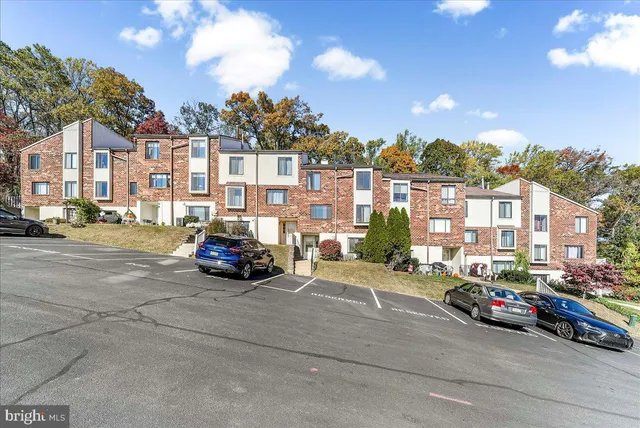 front view of a house with a garden
