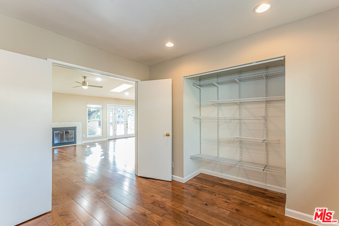 2 Tortoise Shell Irvine, CA 92604 - Photo 12 of 27 a view of an empty room with wooden floor and a window