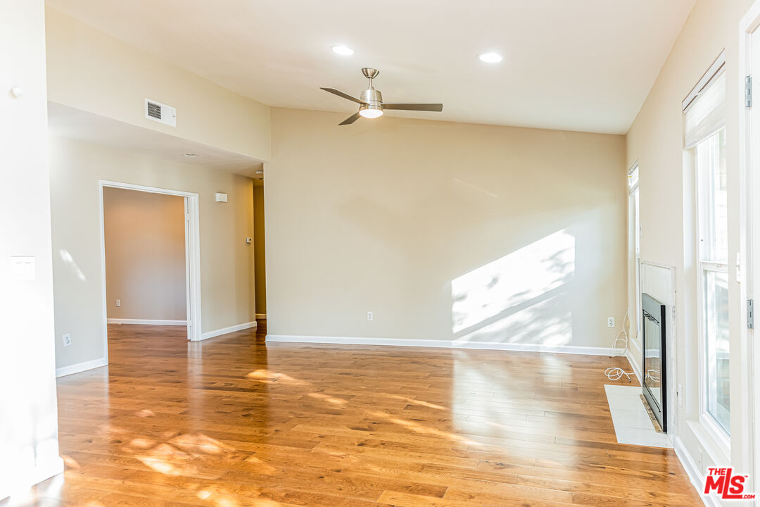 2 Tortoise Shell Irvine, CA 92604 - Photo 13 of 27 a view of empty room with wooden floor and fan
