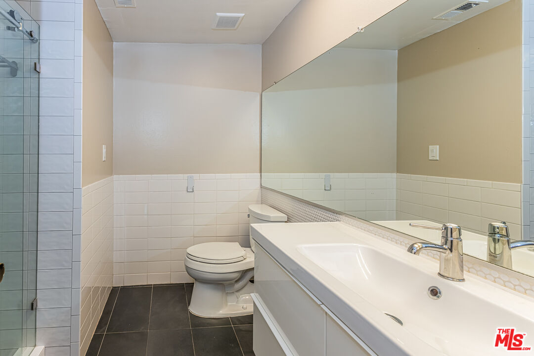 2 Tortoise Shell Irvine, CA 92604 - Photo 24 of 27 a bathroom with a sink and a toilet