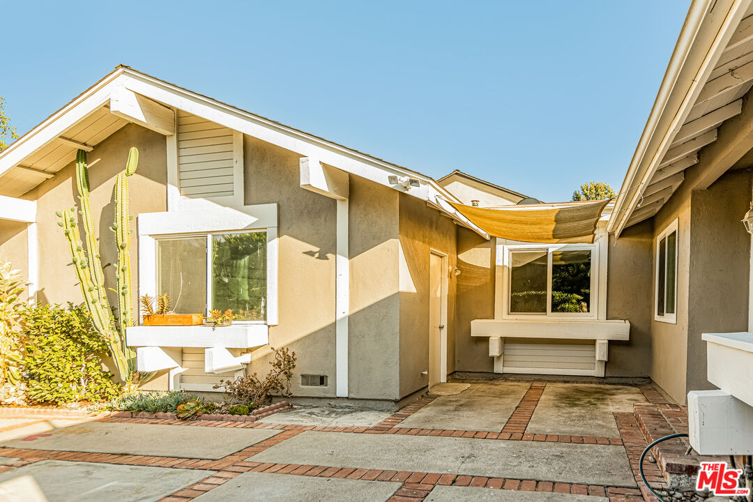 2 Tortoise Shell Irvine, CA 92604 - Photo 27 of 27 a front view of a house with a yard