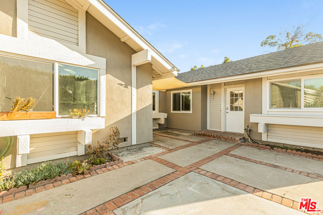 2 Tortoise Shell Irvine, CA 92604 - Photo 10 of 27 a front view of a house with a garage