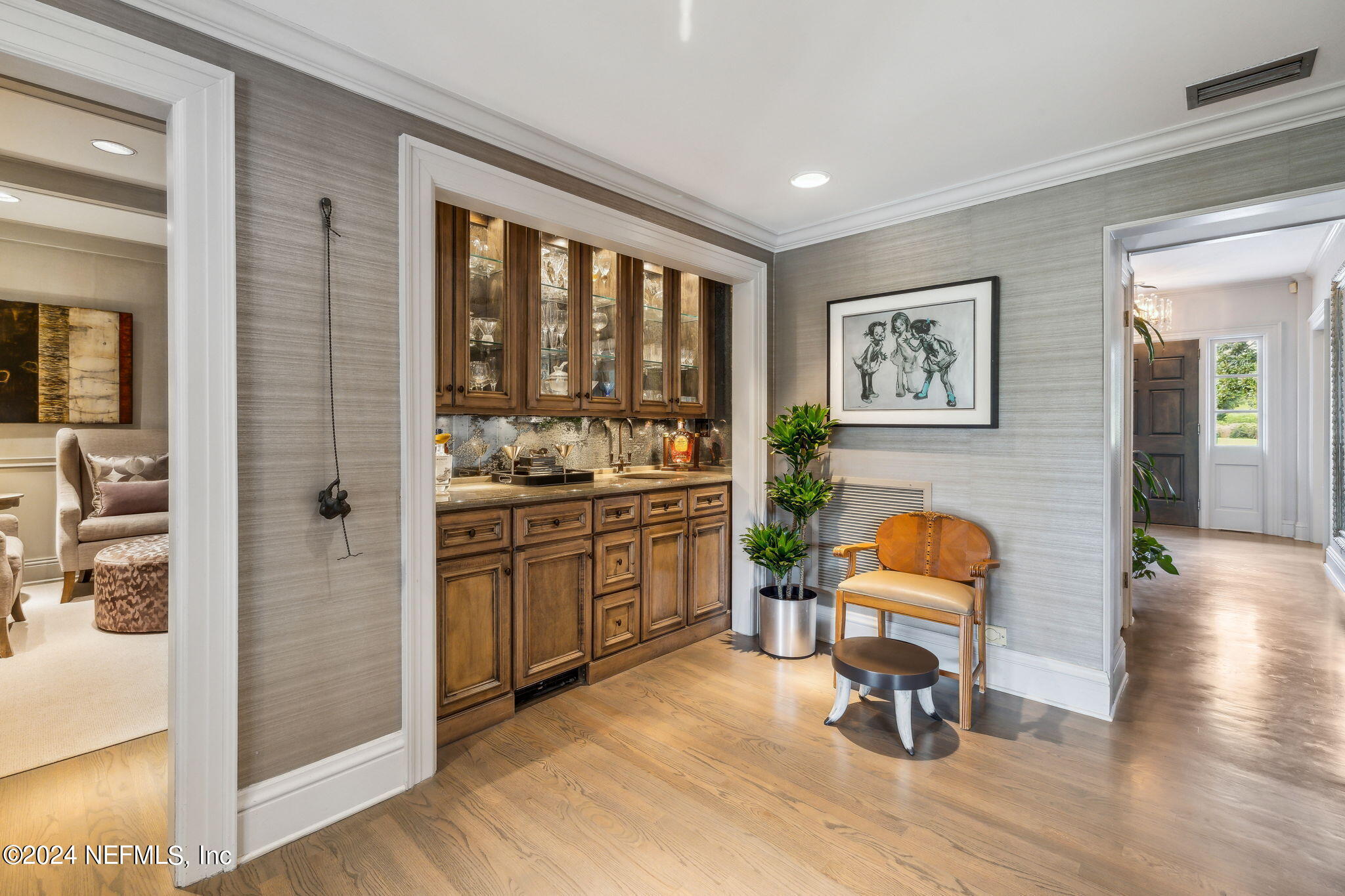 8179 Hollyridge Road Jacksonville, FL 32256 - Photo 17 of 79 Wet Bar to Primary Sitting Room