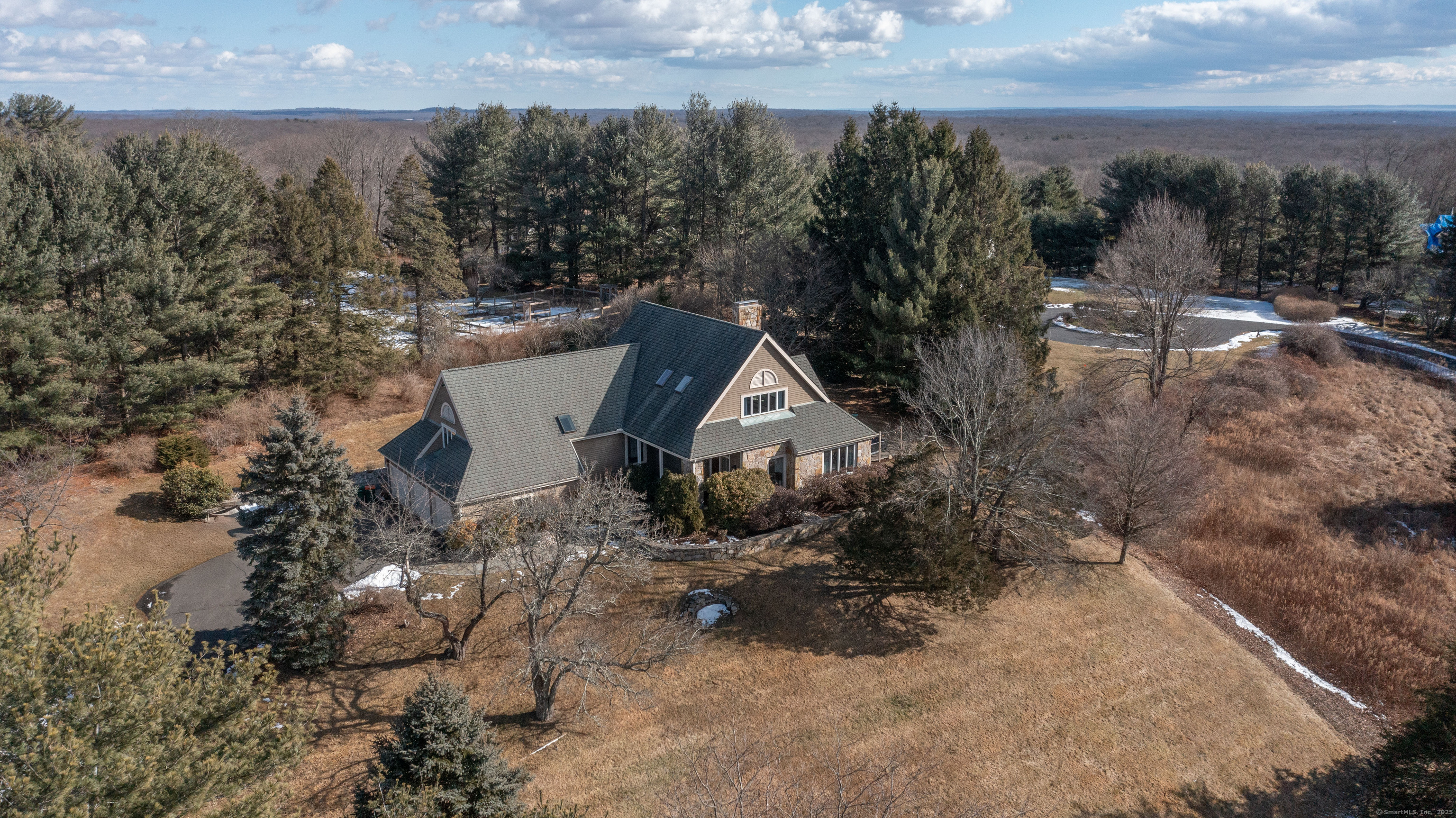 FARVIEW FARM features an inground pool, clubhouse, locker room with shower and kitchen, tennis, and hiking trails.