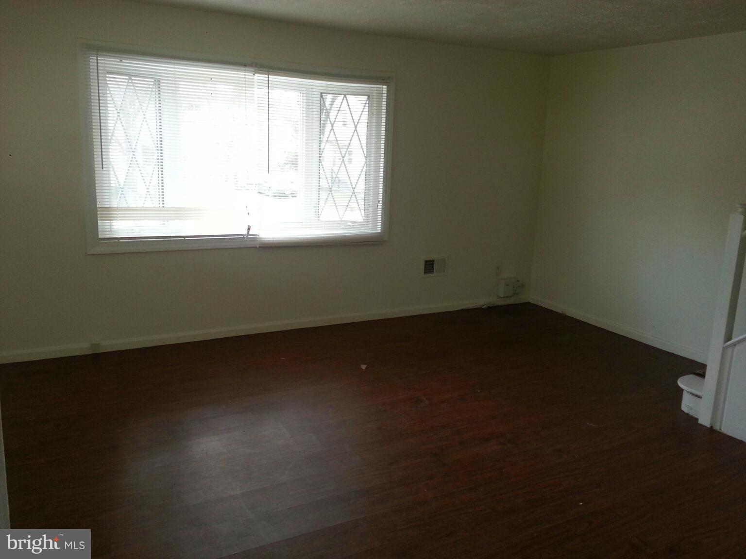 12130 Bluhill Road Silver Spring, MD 20902 - Photo 4 of 6 a view of a room that has a window in it
