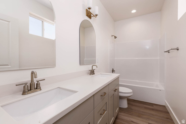 51 West 500 South Monroe, UT 84754 - Photo 20 of 41 Bathroom featuring a dual vanity with a light gray cabinet base, white countertop, and integrated sinks