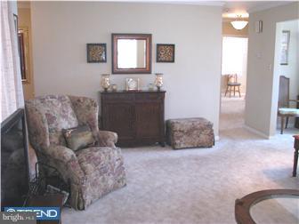 1328 Providence Road Secane, PA 19018 - Photo 4 of 12 a living room with furniture and a mirror