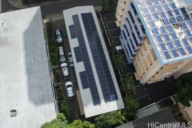 a view of garage and car parked