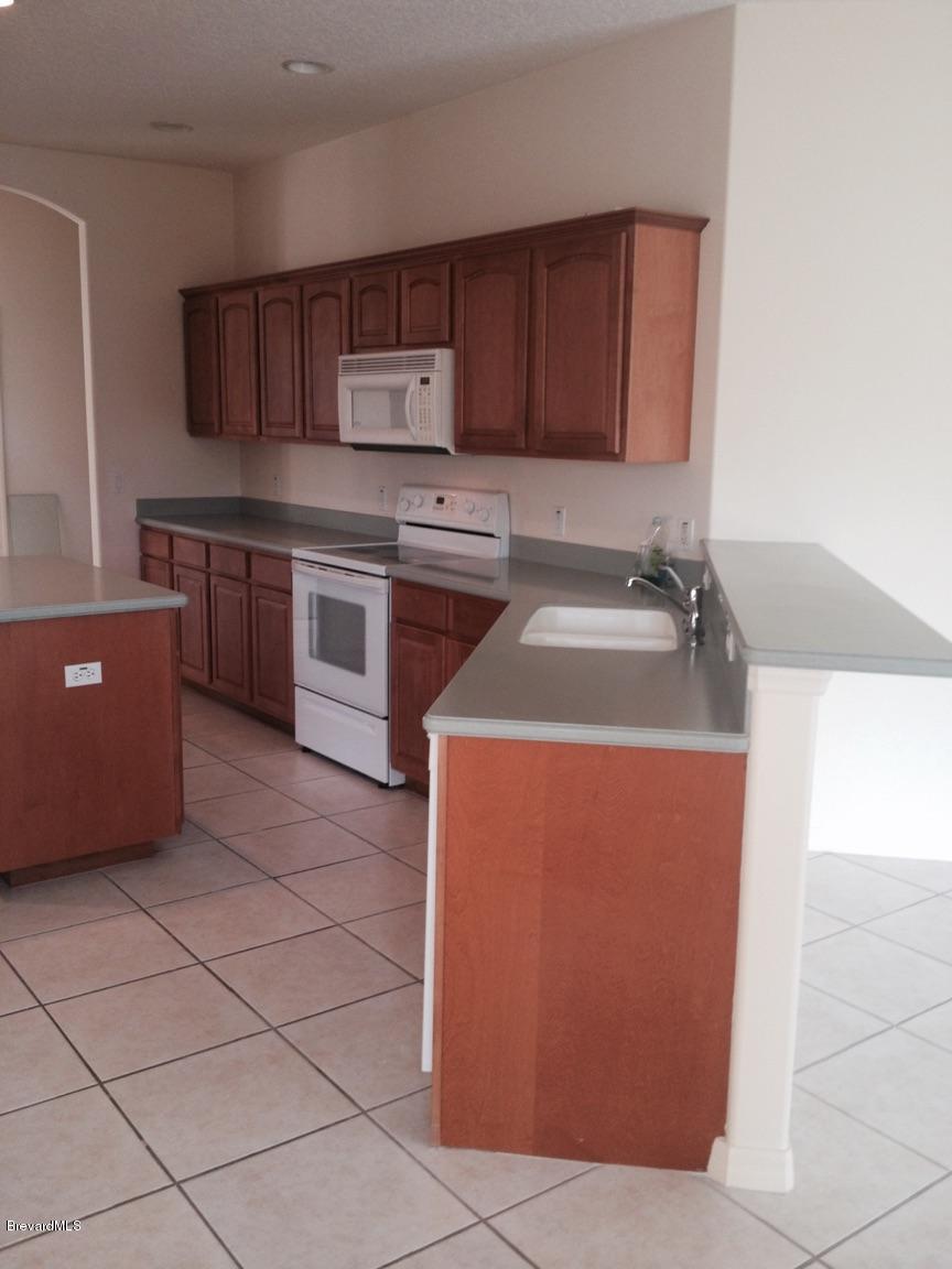 929 Hialeah Street Rockledge, FL 32955 - Photo 8 of 14 FullSizeRender (7).jpg