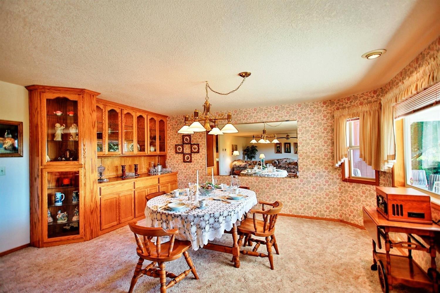 1300 Rounds Avenue Grants Pass, OR 97527 - Photo 7 of 25 Formal dining room and built in hutch.
