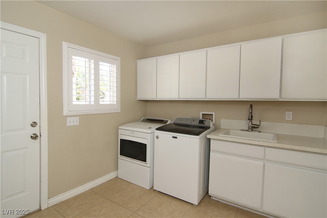 3222 East Viking Road Las Vegas, NV 89121 - Photo 35 of 38 Laundry Room with lots of Cabinets