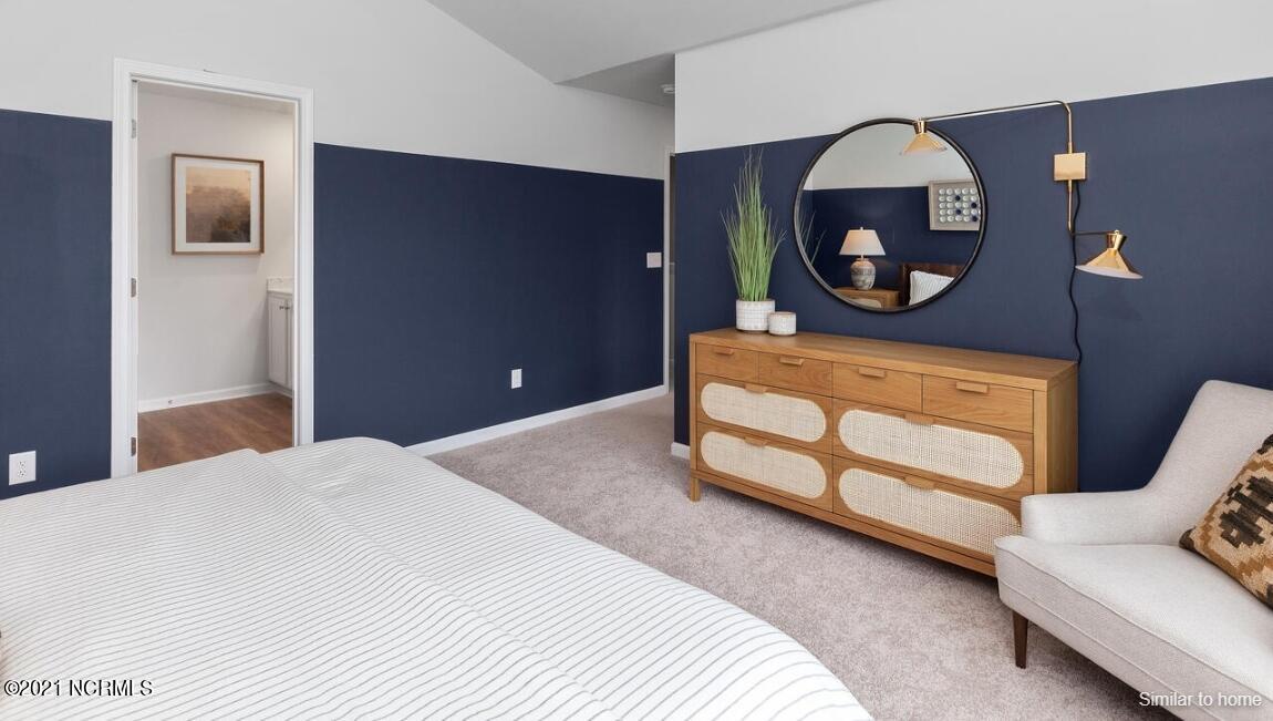 1546 Dove Shell Way, Unit 44 Wilmington, NC 28405 - Photo 17 of 22 master bedroom with vaulted ceilings