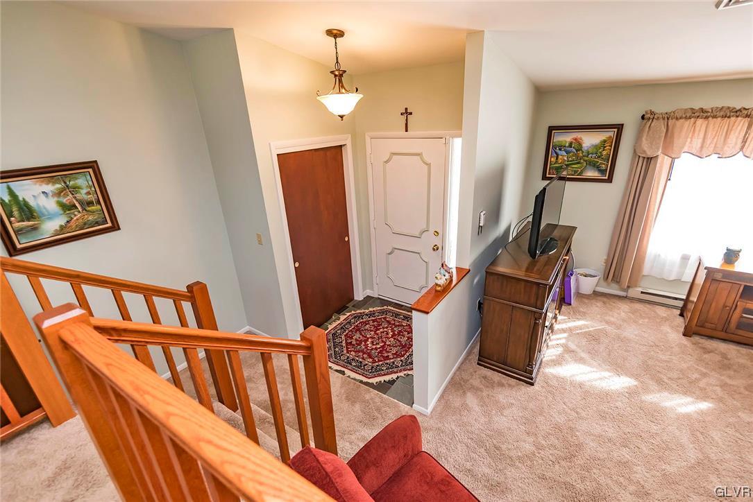 360 North 9th Street Bangor, PA 18013 - Photo 14 of 34 a living room with furniture a flat screen tv and a window