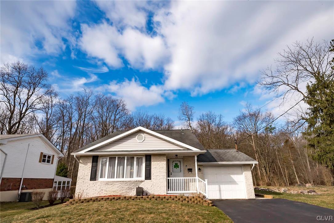 360 North 9th Street Bangor, PA 18013 - Photo 2 of 34 a front view of a house with a garden