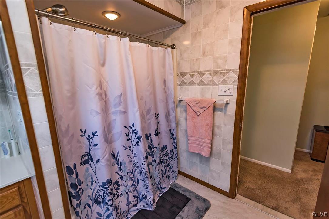 360 North 9th Street Bangor, PA 18013 - Photo 28 of 34 a bathroom with a shower and a tub