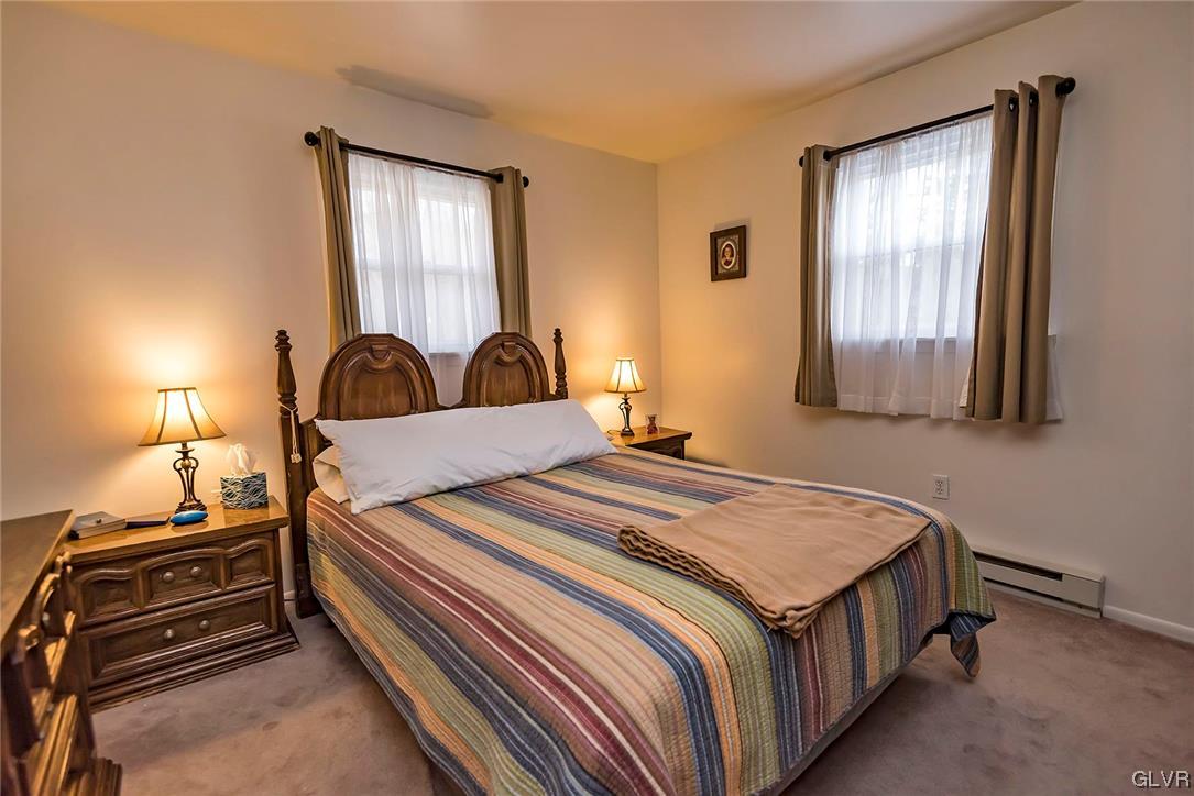 360 North 9th Street Bangor, PA 18013 - Photo 29 of 34 a bedroom with a bed and wooden floor