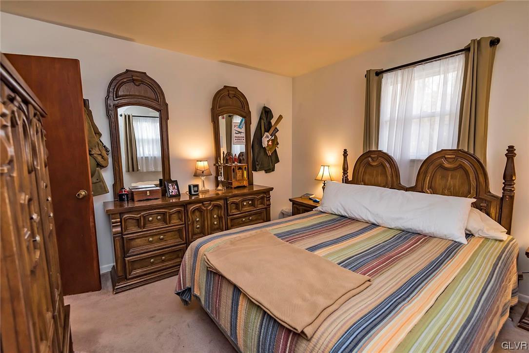 360 North 9th Street Bangor, PA 18013 - Photo 30 of 34 a bedroom with two beds and dresser with mirror