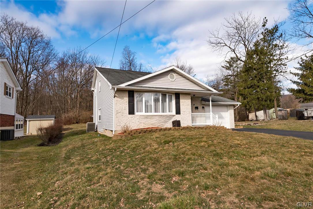 360 North 9th Street Bangor, PA 18013 - Photo 4 of 34 a front view of a house with a garden