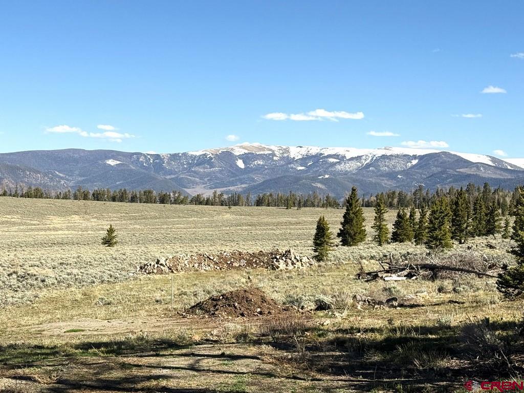 a view of a lake with mountains in the background