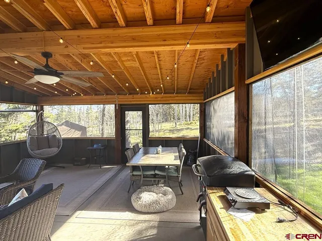 a living room with large window