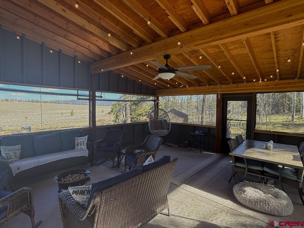 5333 Oso Creek Road Powderhorn, CO 81243 - Photo 12 of 18 a living room with large window