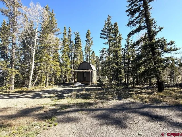 a view of outdoor space with lots of trees