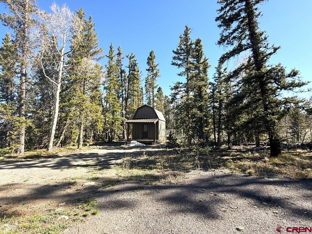 5333 Oso Creek Road Powderhorn, CO 81243 - Photo 15 of 18 a view of a street with a building in the background