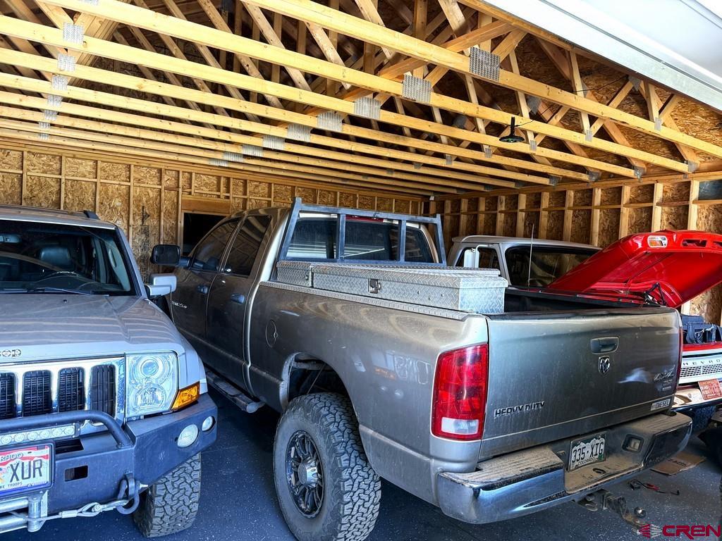 5333 Oso Creek Road Powderhorn, CO 81243 - Photo 6 of 18 a car parked in front of a building