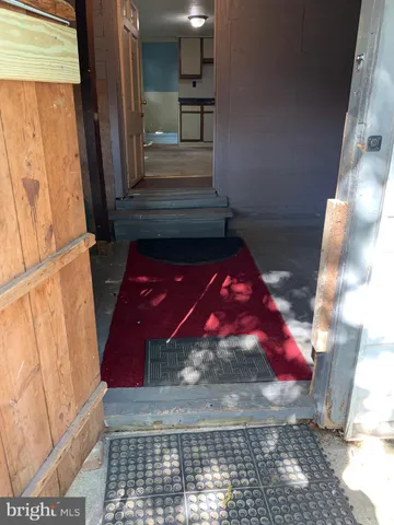 a patio with table and chairs