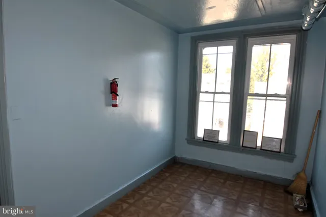 an empty room with windows