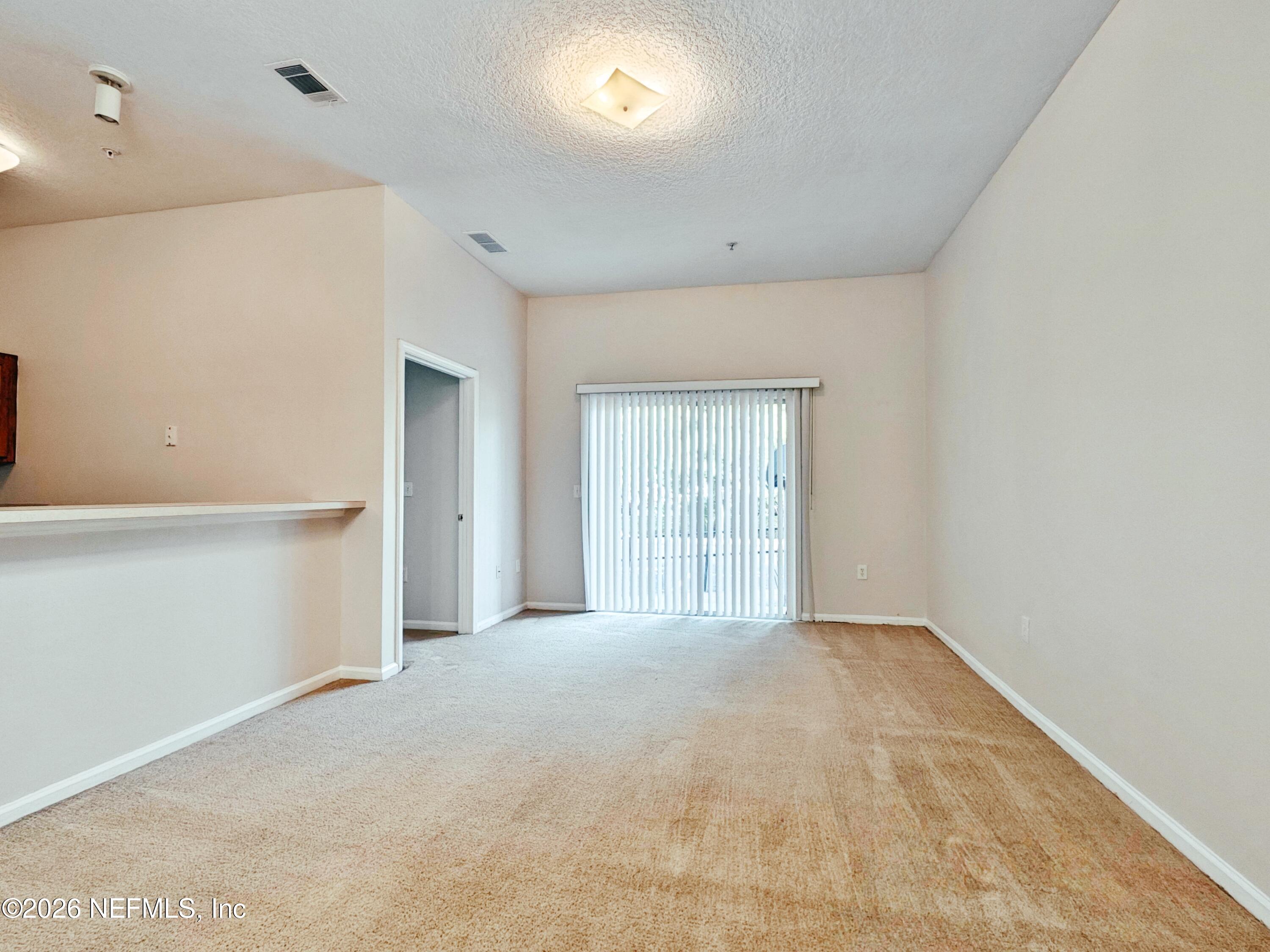 7920 Merrill Road, Unit 503 Jacksonville, FL 32277 - Photo 7 of 10 07. Living