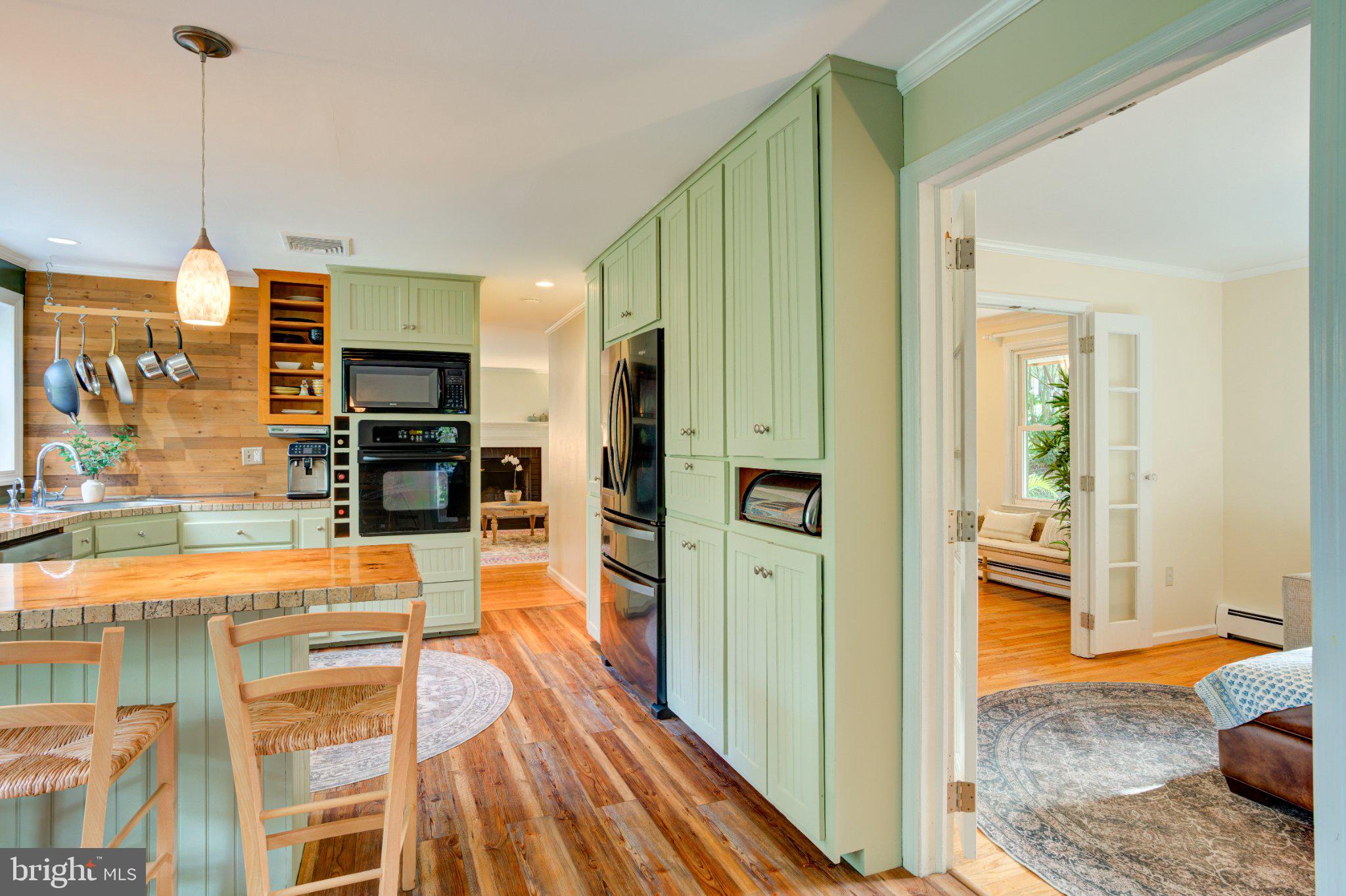 31 Green Valley Road Wallingford, PA 19086 - Photo 16 of 67 Kitchen with French Doors to Family Room