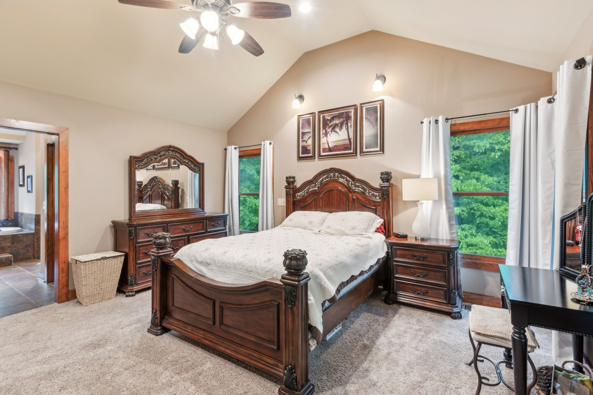 4455 Tarsus Road Palmyra, TN 37142 - Photo 26 of 38 a bedroom with a bed and a chandelier