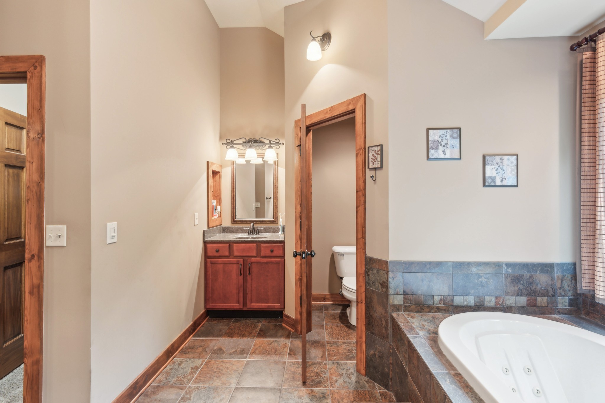 4455 Tarsus Road Palmyra, TN 37142 - Photo 28 of 38 a bathroom with a bathtub and a sink