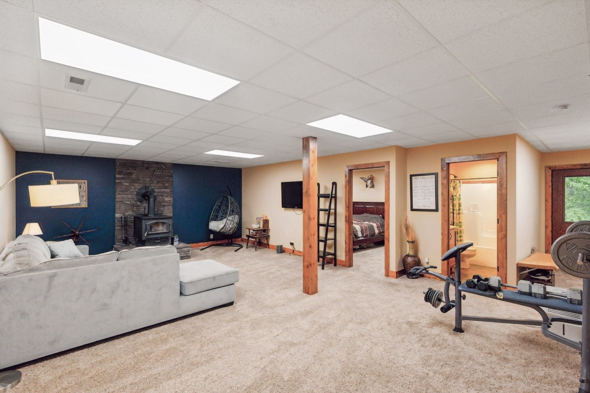 4455 Tarsus Road Palmyra, TN 37142 - Photo 29 of 38 a view of a livingroom with furniture and a flat screen tv