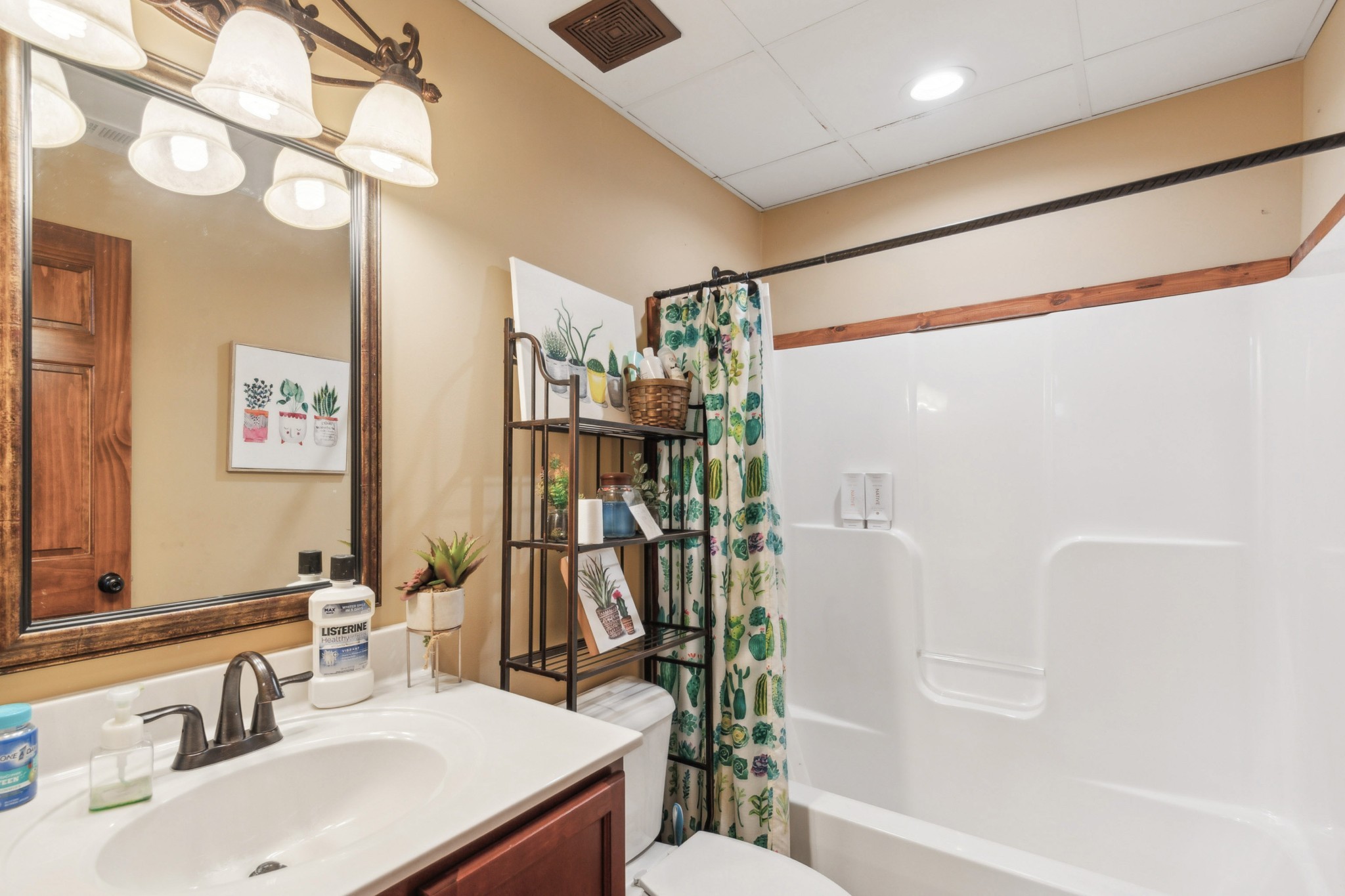 4455 Tarsus Road Palmyra, TN 37142 - Photo 30 of 38 a bathroom with a sink toilet and shower
