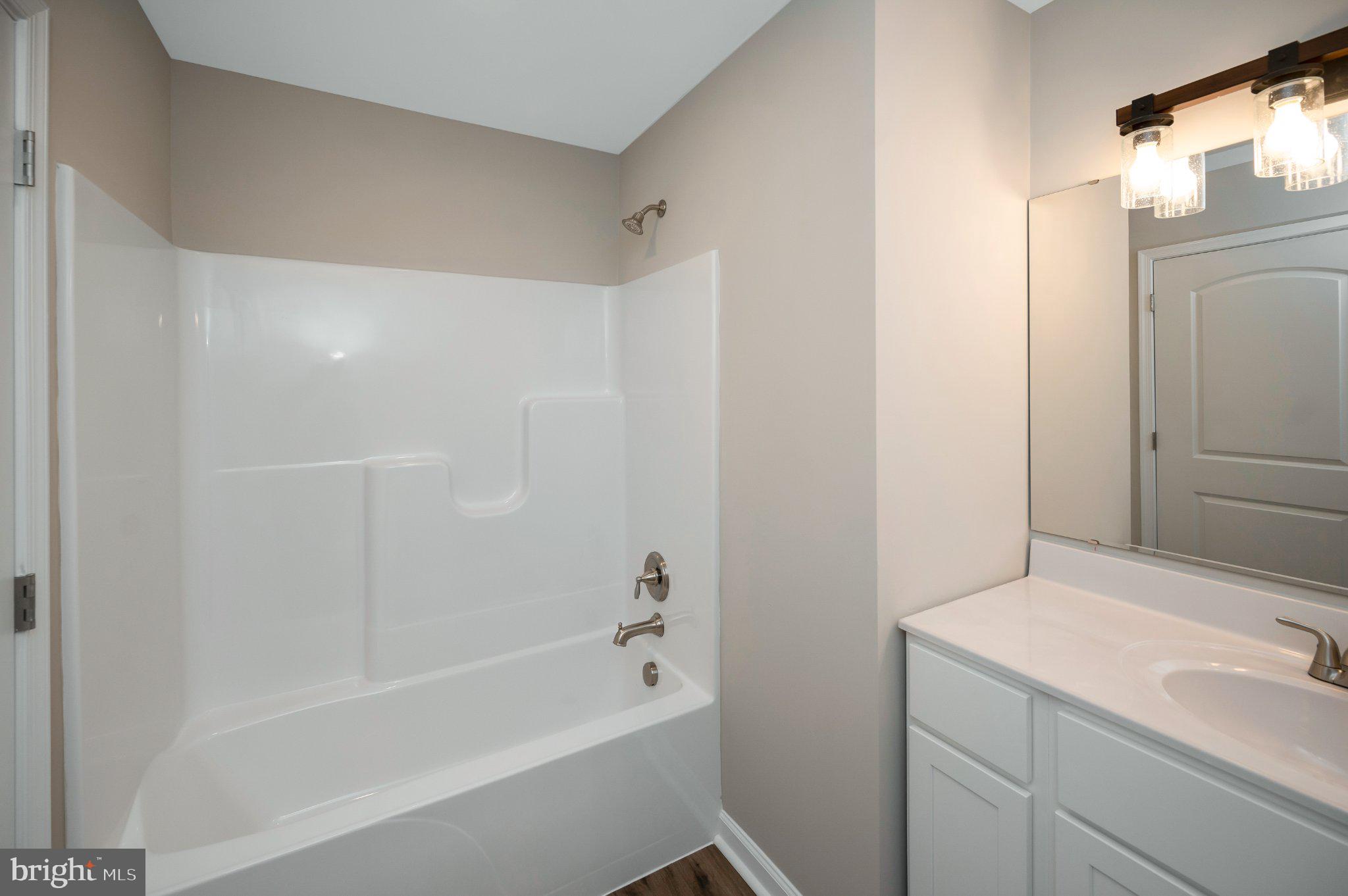 28150 Tatum Road Unionville, VA 22567 - Photo 21 of 28 Modern bathroom with sleek finishes.