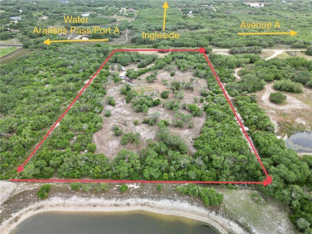 0 West Rhodes Avenue Aransas Pass, TX 78336 - Photo 9 of 11 a view of a garden with a pathway