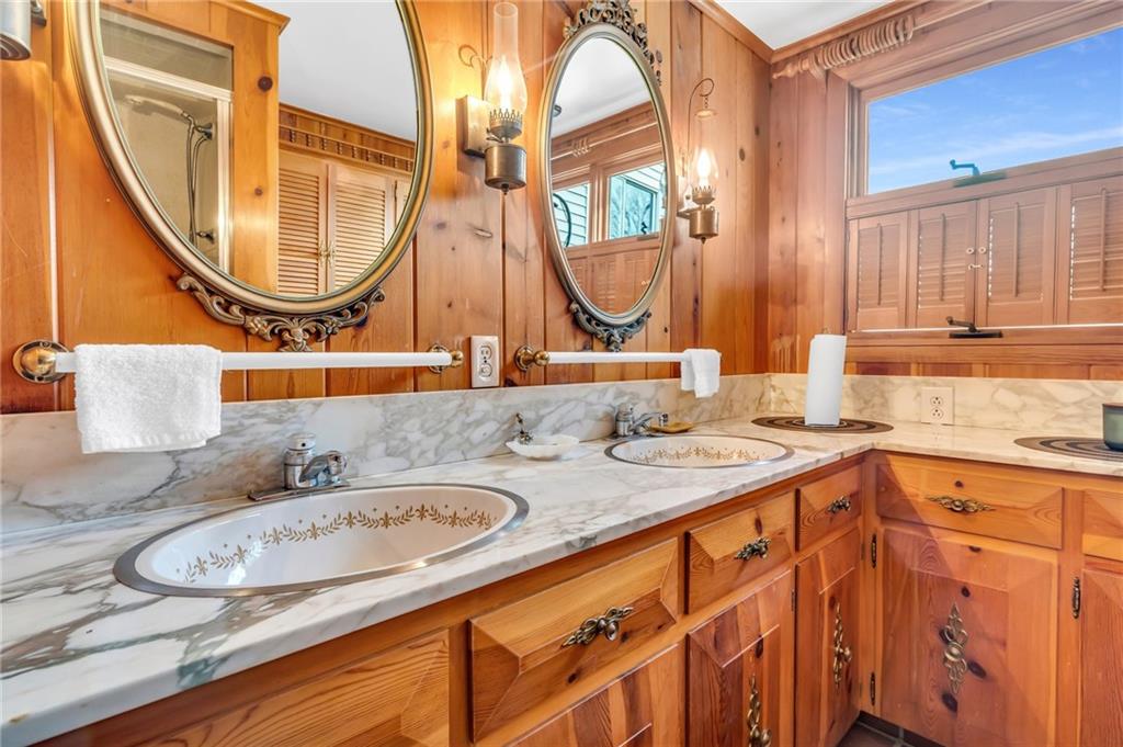5802 Maple Way Jamestown, PA 16134 - Photo 14 of 24 a bathroom with a granite countertop sink and a mirror