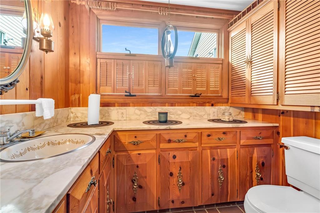 5802 Maple Way Jamestown, PA 16134 - Photo 15 of 24 a bathroom with a granite countertop toilet a sink and a bathtub