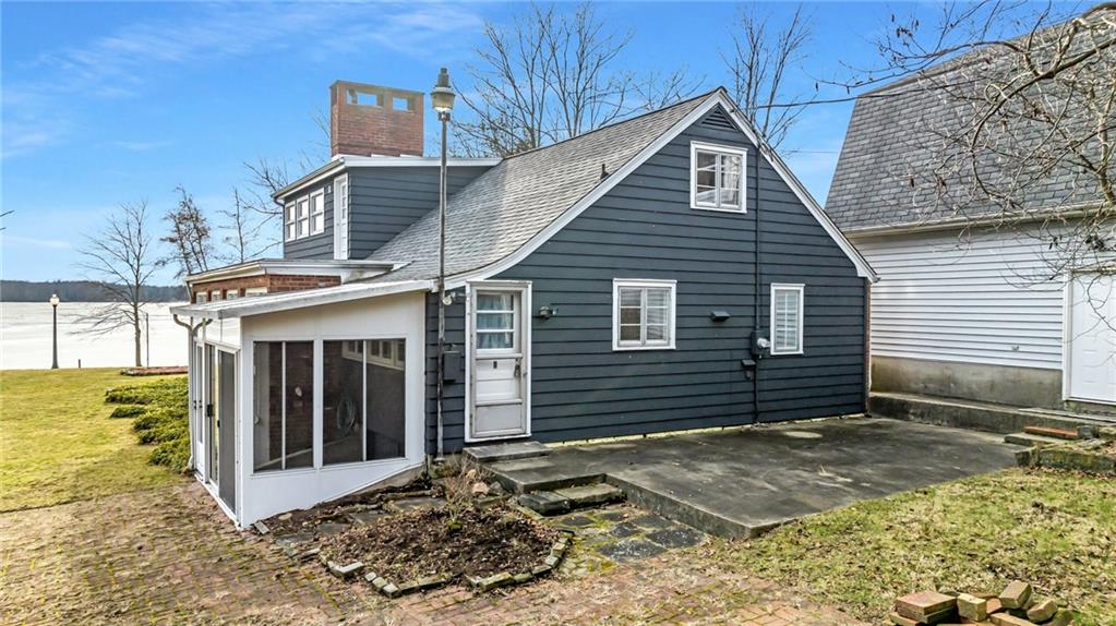 5802 Maple Way Jamestown, PA 16134 - Photo 3 of 24 a front view of a house with a yard