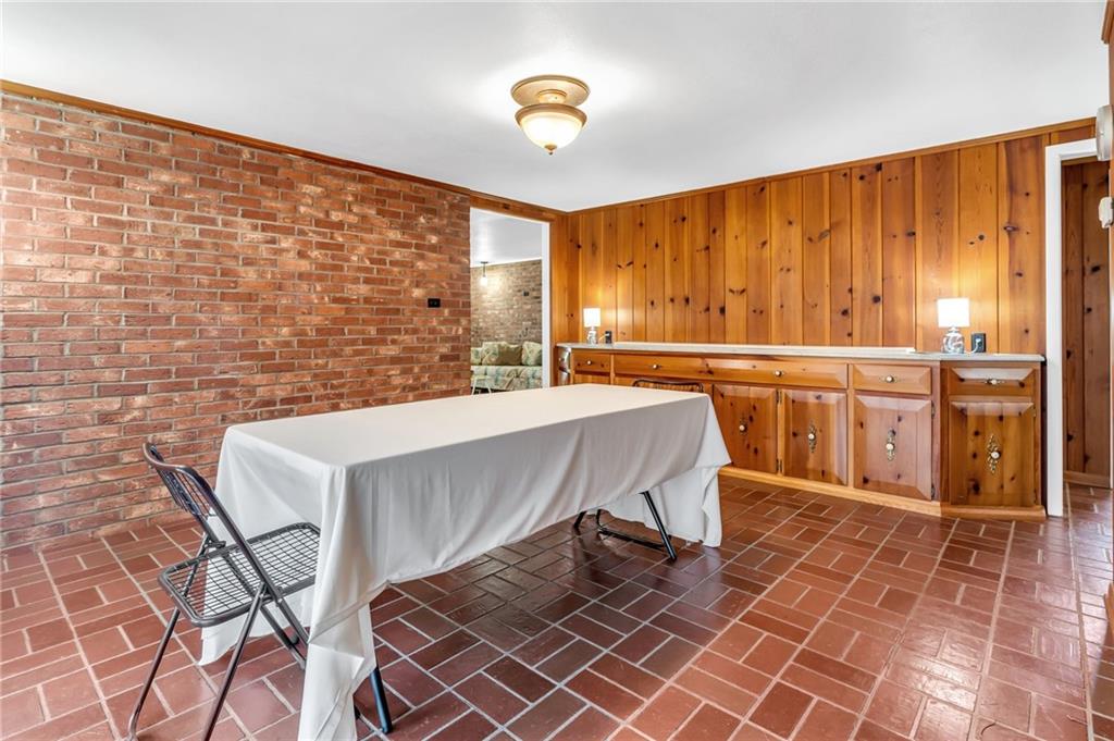 5802 Maple Way Jamestown, PA 16134 - Photo 6 of 24 a living room with a table and a chandelier