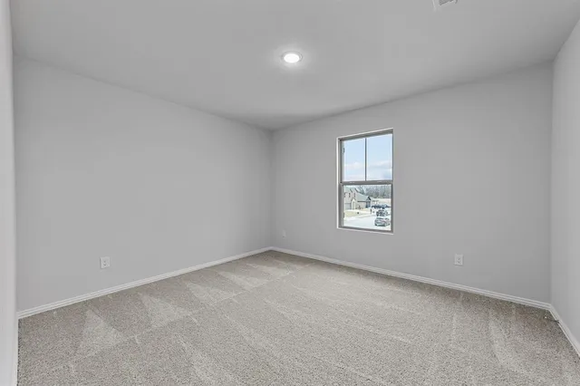 an empty room with a natural light