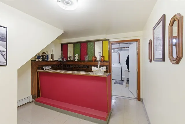 a kitchen with stainless steel appliances granite countertop a refrigerator and a stove
