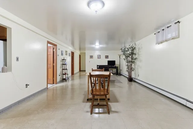 a kitchen with a refrigerator and a stove