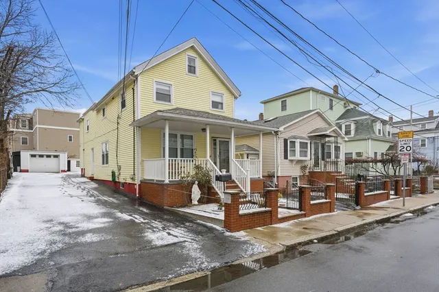 a front view of a house with a patio