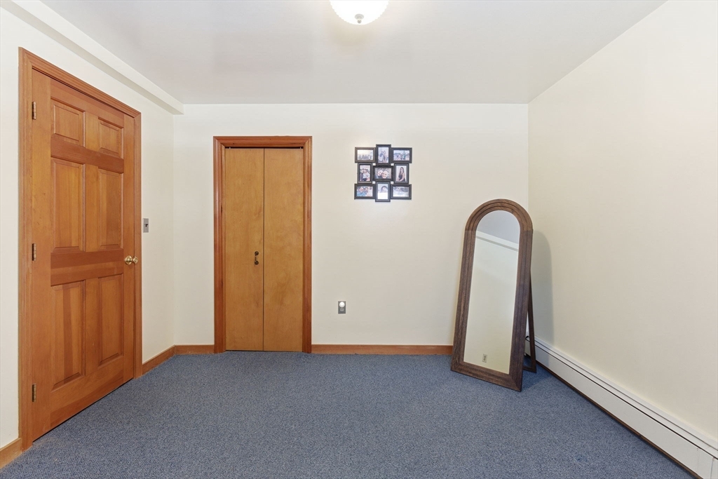 71-73 Oak Street Somerville, MA 02143 - Photo 22 of 42 an empty room with window